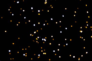 Siyah arkaplanda parlayan ışıklar