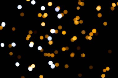 Siyah arkaplanda bokeh ışıkları