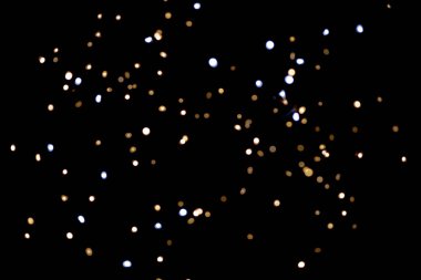 Siyah arkaplanda parlayan ışıklar