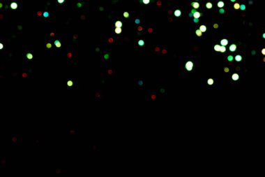 Siyah arkaplanda bokeh ışıkları