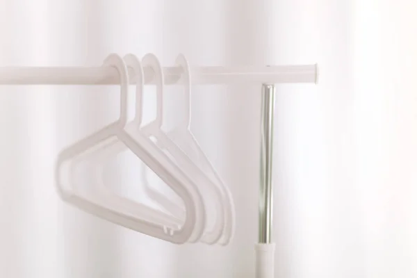 Stylish white hangers — Stock Photo, Image