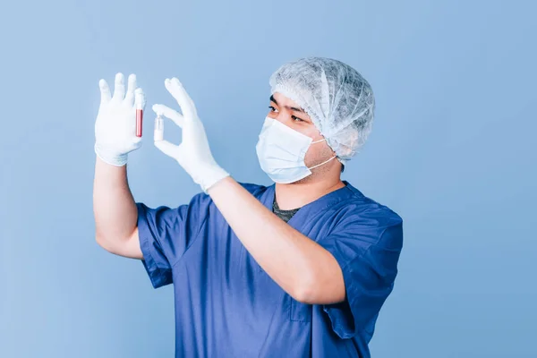 Doctor holding test tube — Stock Photo, Image