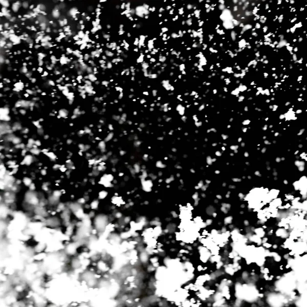 Biały śnieg na czarnym tle — Zdjęcie stockowe