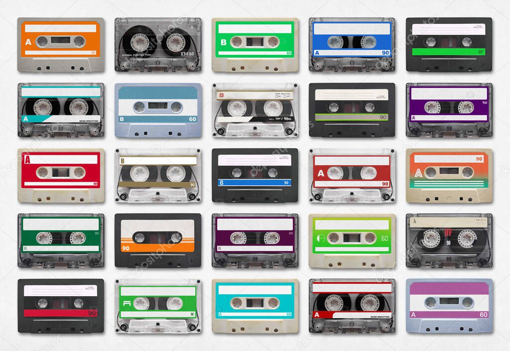 25 audio cassettes isolated on white background.