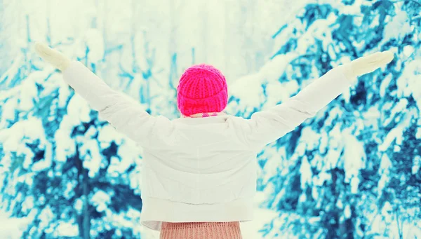 Winter happy woman enjoys good weather over snowy background — Stock Photo, Image