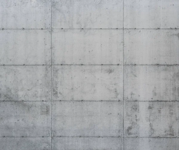 Birkaç bloğa ayrılmış yeni beton duvar. Özgeçmiş için uygun