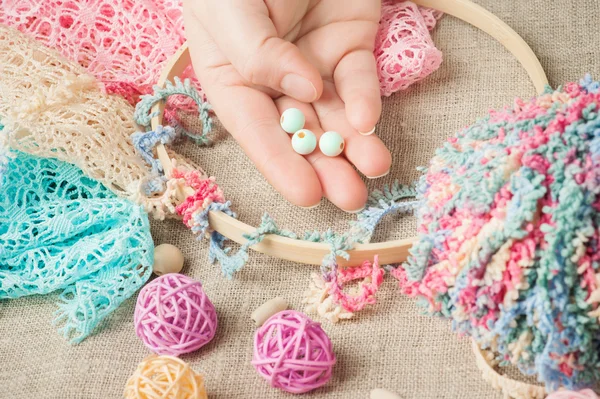 Handmade dream catcher and hands — Stock Photo, Image