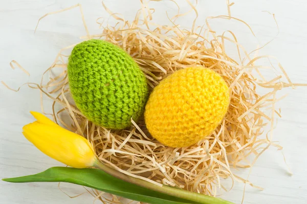 Green yellow crocheted easter eggs — Stock Photo, Image