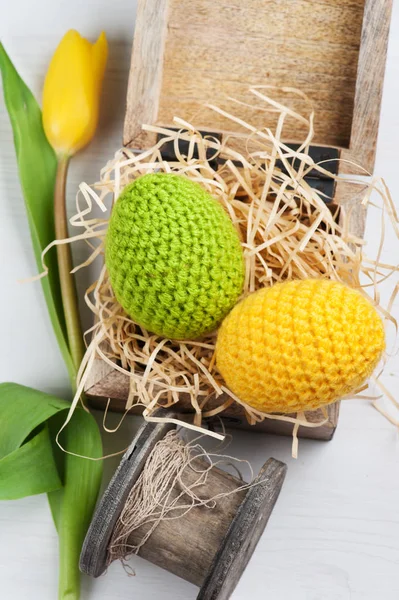 Green yellow crocheted easter eggs — Stock Photo, Image