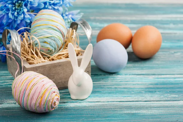 Eggs, flowers and decorative rabbit — Stock Photo, Image