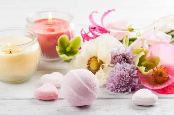 Bath bombs on old wooden background — Stock Photo, Image