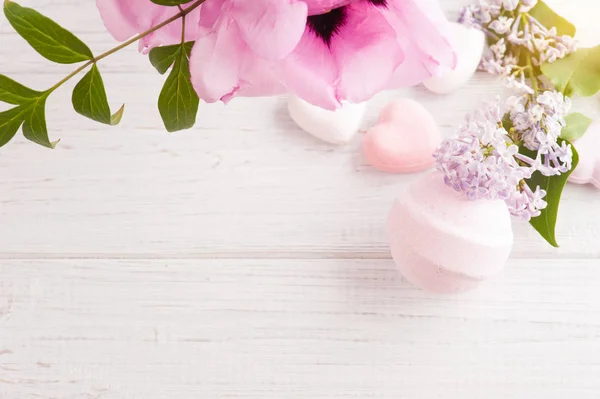 Bath bombs on old wooden background — Stock Photo, Image