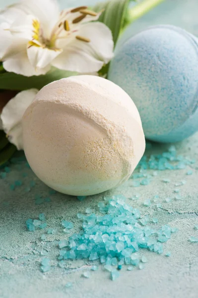 Bath bombs on blue concrete background — Stock Photo, Image