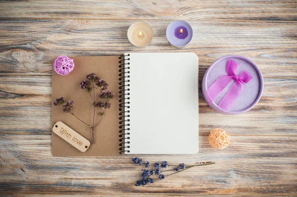 Notebook, lavender flowers, candles