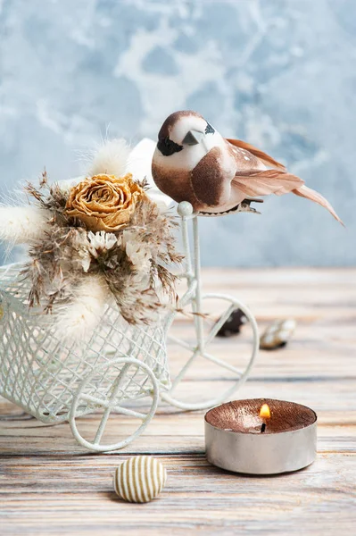 Bouquet of dry flowers on decorative bike — 스톡 사진