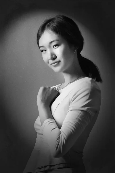 Black white photo  asian model in a black evening dress posing — Stock Photo, Image