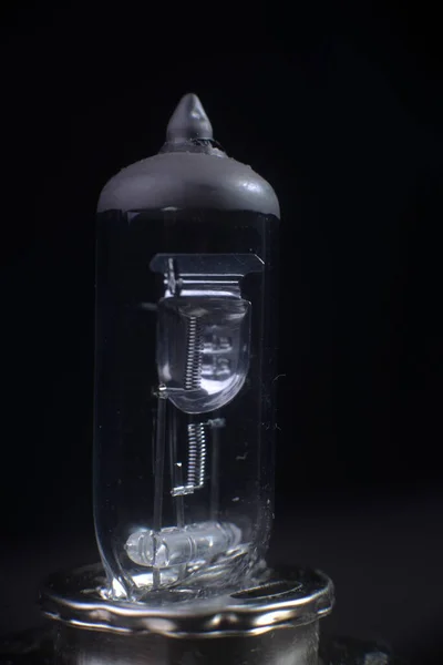 Halogen car lamp on a black background