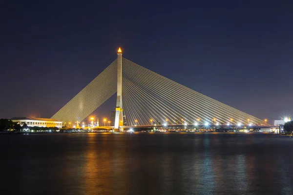 Big Suspension bridge with lighting in night time / Rama 8 bridge in night time