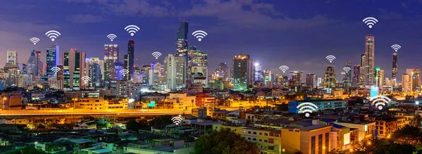 wifi in city / wifi sign and high building in panorama view of the city