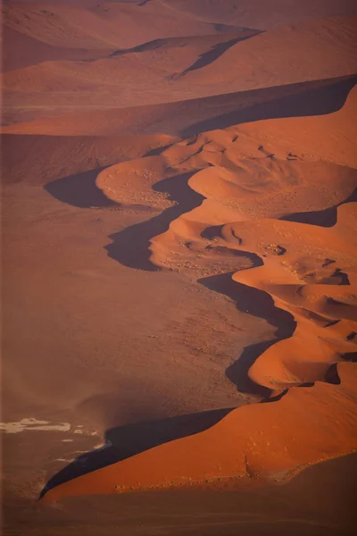 Beautiful desert dunes on sunset — Stock Photo, Image
