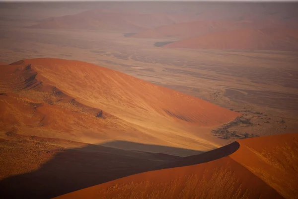 Beautiful desert dunes on sunset — Stock Photo, Image