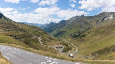 Panoramic view of the ascent by road to the tourmalet col clipart