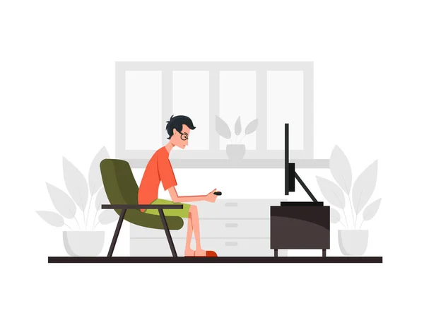 O homem senta-se em um sofá e joga console de jogos. Ilustração colorida . —  Vetores de Stock