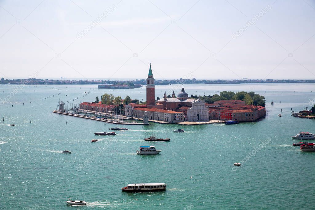 Island and Church of San Giorgio Maggiore, Heavy ship, boat and Vaporetto traffic in Venetian Lagoon as seen from St. Mark's Campanile, Venice, Italy