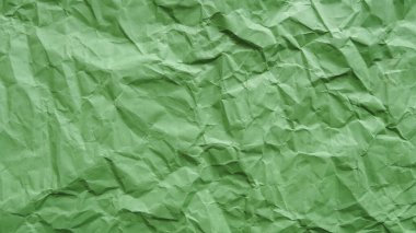 Buruşmuş yeşil geri dönüştürülmüş kağıt, soyut arkaplan, kopyalama alanı