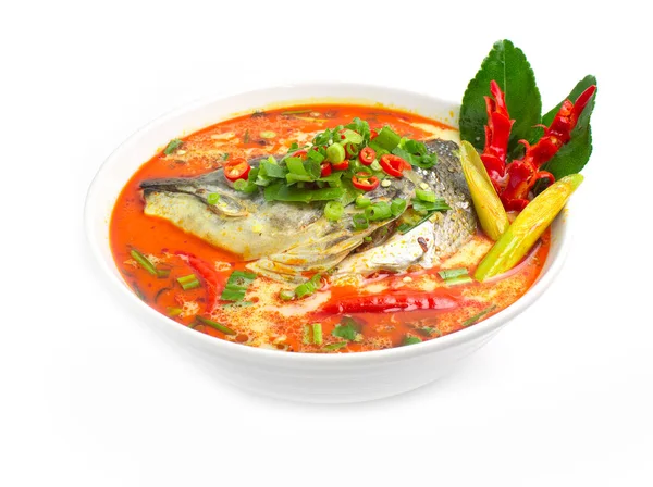 Thai Spicy Salmon Soup Hot chili in coconut milk Thai spicy food (Tom Yum Salmon) the best of Thailand decorate carved chili side view