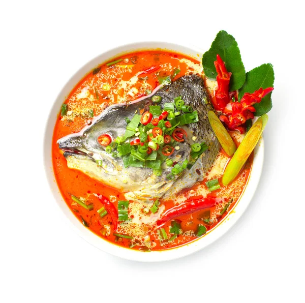 Thai Spicy Salmon Soup Hot chili in coconut milk Thai spicy food (Tom Yum Salmon) the best of Thailand decorate carved chili top view