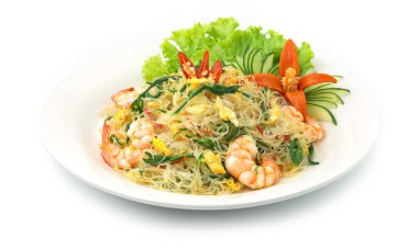 Acacia, yumurta ve karidesli kızarmış Vermicelli Erişte sebzeleri, salatalıkları ve Chili Thai yemeklerini süslüyor. İyi huylu Asya Füzyon Tarzı