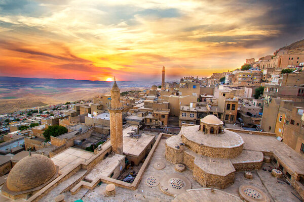 Mardin landscape beautiful sunset with clouds Turkey. With minarets is best touristic destination of Mardin.
