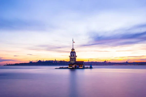 Maiden\'s tower in istanbul beautiful colorful sunset (Turkish:Kiz Kulesi) from Uskudar. Istanbul symbol. Romantic Istanbul Sunset Landscape. Istanbul Bosphorus and Maiden\'s Tower amazing lights Turkey