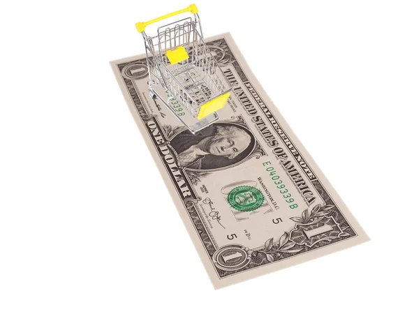 Carrinho de compras e dólar no fundo branco — Fotografia de Stock