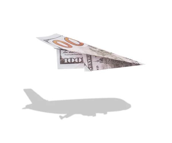 Honderd dollar papieren vliegtuigje met een natuurlijke vliegtuig schaduw — Stockfoto