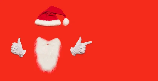 Santa Claus minimal concept. Red background. Christmas New Year flat lay. — 스톡 사진