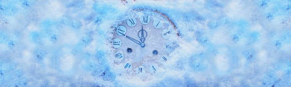 Frozen clock on New Year\'s background. Christmas concept