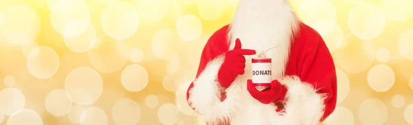 Noel Baba Nın Elinde Sarı Bokeh Arka Planı Için Bağış — Stok fotoğraf