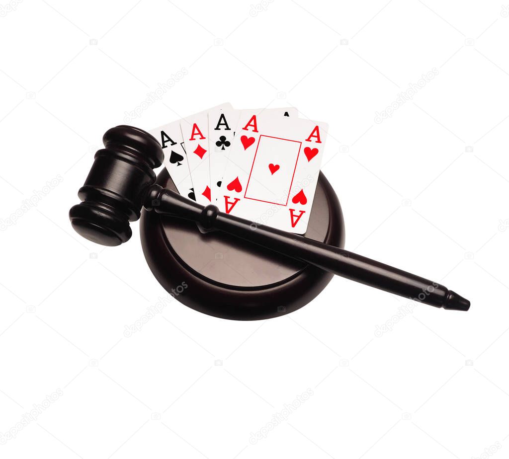 Judge gavel and playing cards isolated on white background. Gambling law.