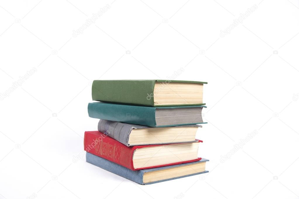 stack of five books with color covers 