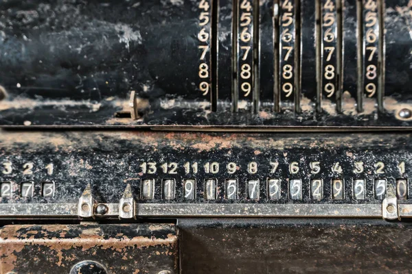 Old rusty metallic black calculator — Stock Photo, Image