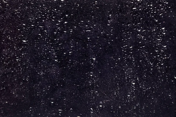 Camda su damlaları olan soyut arkaplan