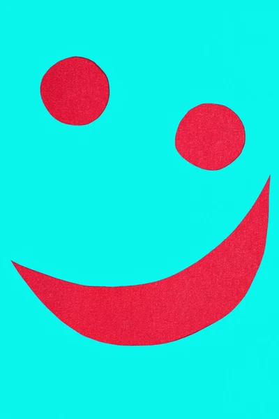 Smiley on red fabric — Stock Photo, Image