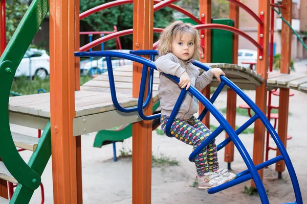 Girl on the stairs at playground — Stock Photo, Image