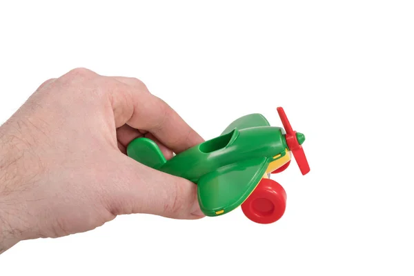 Adam el oyuncak uçak tarafından oynanır — Stok fotoğraf