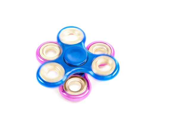 Blue spinning spinner on fixed pink — Stock Photo, Image