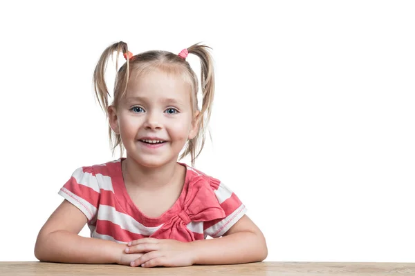 Portret van mooi meisje aan tafel — Stockfoto