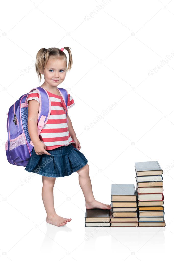Schoolgirl walks the steps of books