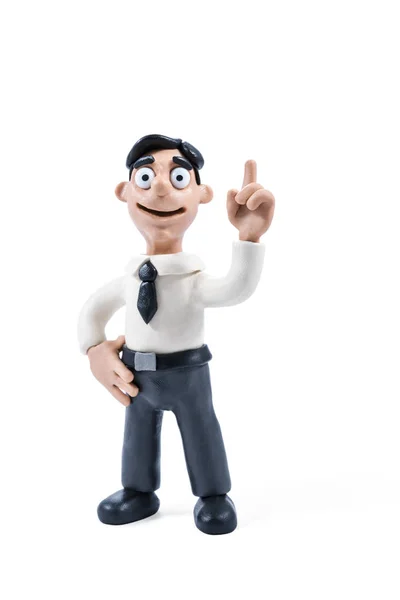 Plasticine businessman with his index finger upwards — Stock Photo, Image